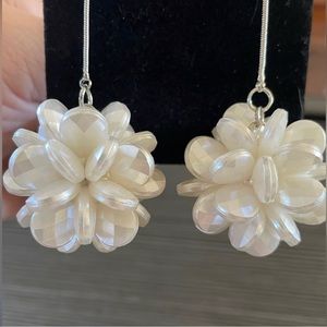 White and silver earrings